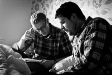 Paul and Stewart discuss a scene on set.